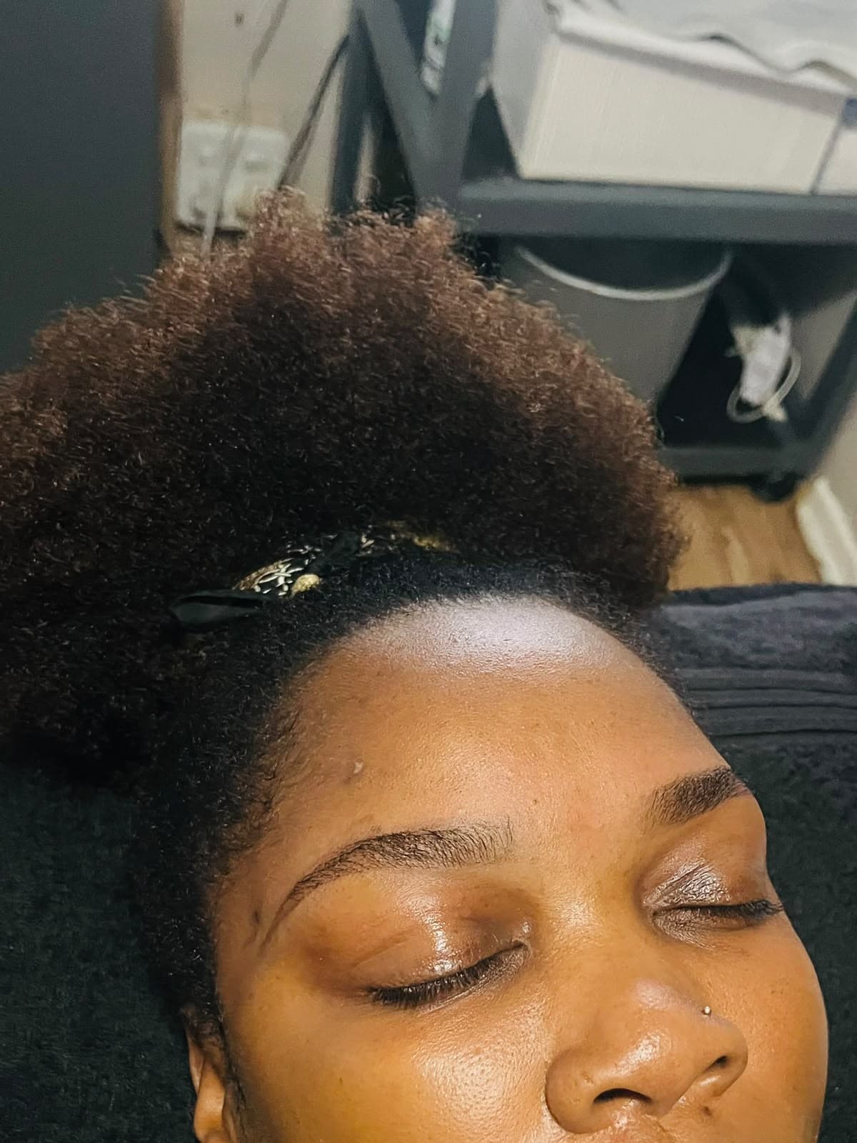 Clean, softly arched brows after professional brow shaping