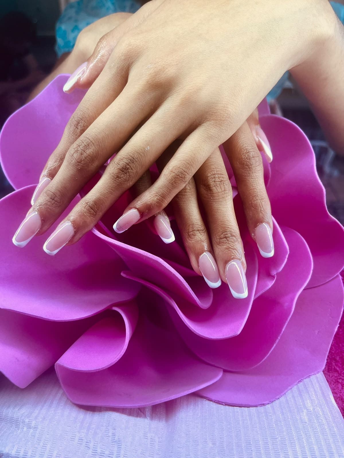Classic French tip nails with tips and gel overlay at Marvelous Beauty Spa, Lansdowne