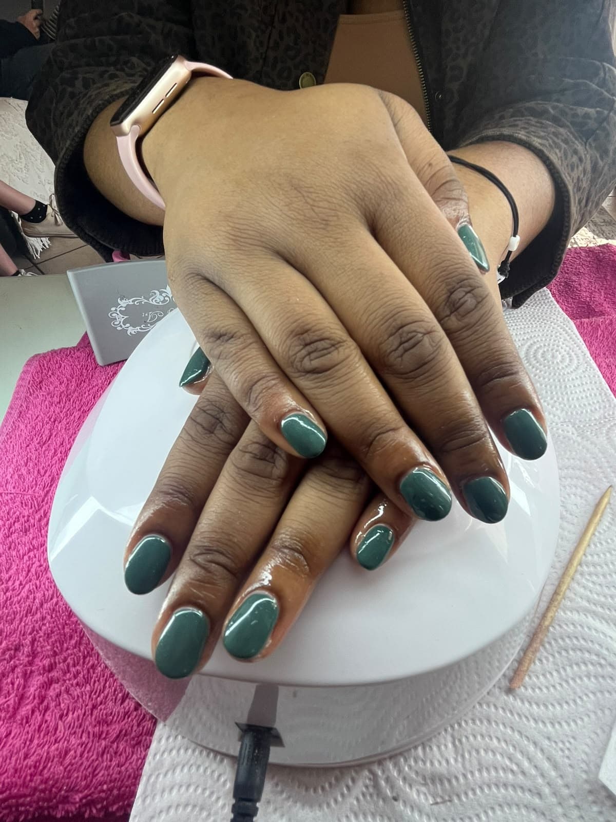 Sage green gel manicure on short round nails