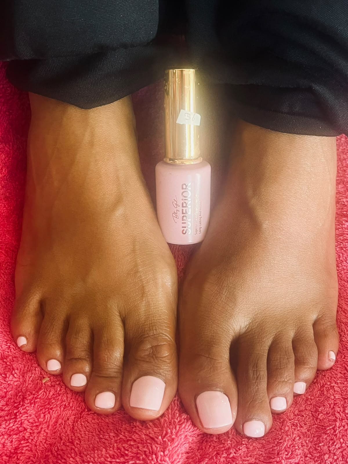 Soft baby pink gel pedicure with salon-quality gel polish